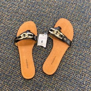 Black and gold sandals